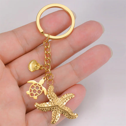 Sleutelhanger oceaan thema | Schildpad, zeester & schelp hanger | RVS | Trendy sleutelhanger voor tas, rugzak of sleutelbos | Zomercadeau strandliefhebber