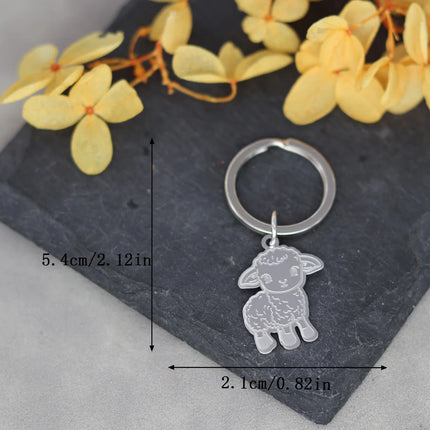 Cartoon schaap sleutelhanger voor kinderen | Roestvrijstalen dierenbedel | Unisex accessoire | Zilver/goud | DIY sieraden maken | Cadeau Decoratie