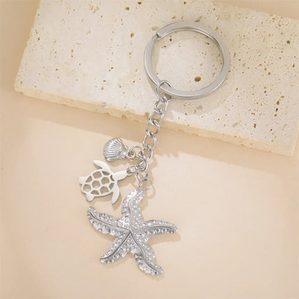 Sleutelhanger oceaan thema| RVS sleutelring met schildpad, zeester en schelp| Zomer accessoire voor rugzak| Cadeau voor strandliefhebbers| Unisex| My Shape