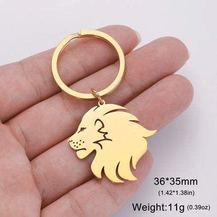 Leeuwenkop Sleutelhanger van RVS | Tribal Totem Dierenhanger | Stoere Sleutelhanger voor Tas of Sleutelbos | Unisex Accessoire | Dawapara | Goud & Zilver | Roestvrijstaal | Symboliseert Kracht & Moed