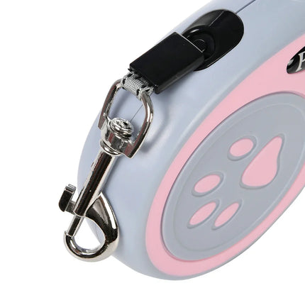 Hondenriem met Pootafdruk | Ergonomische Handgreep | Nylon | Snelontgrendelingsfunctie | Uittrekbaar tot 5 meter | Voor Kleine en Middelgrote Huisdieren | Meerdere Kleuren | Veilig en Duurzaam